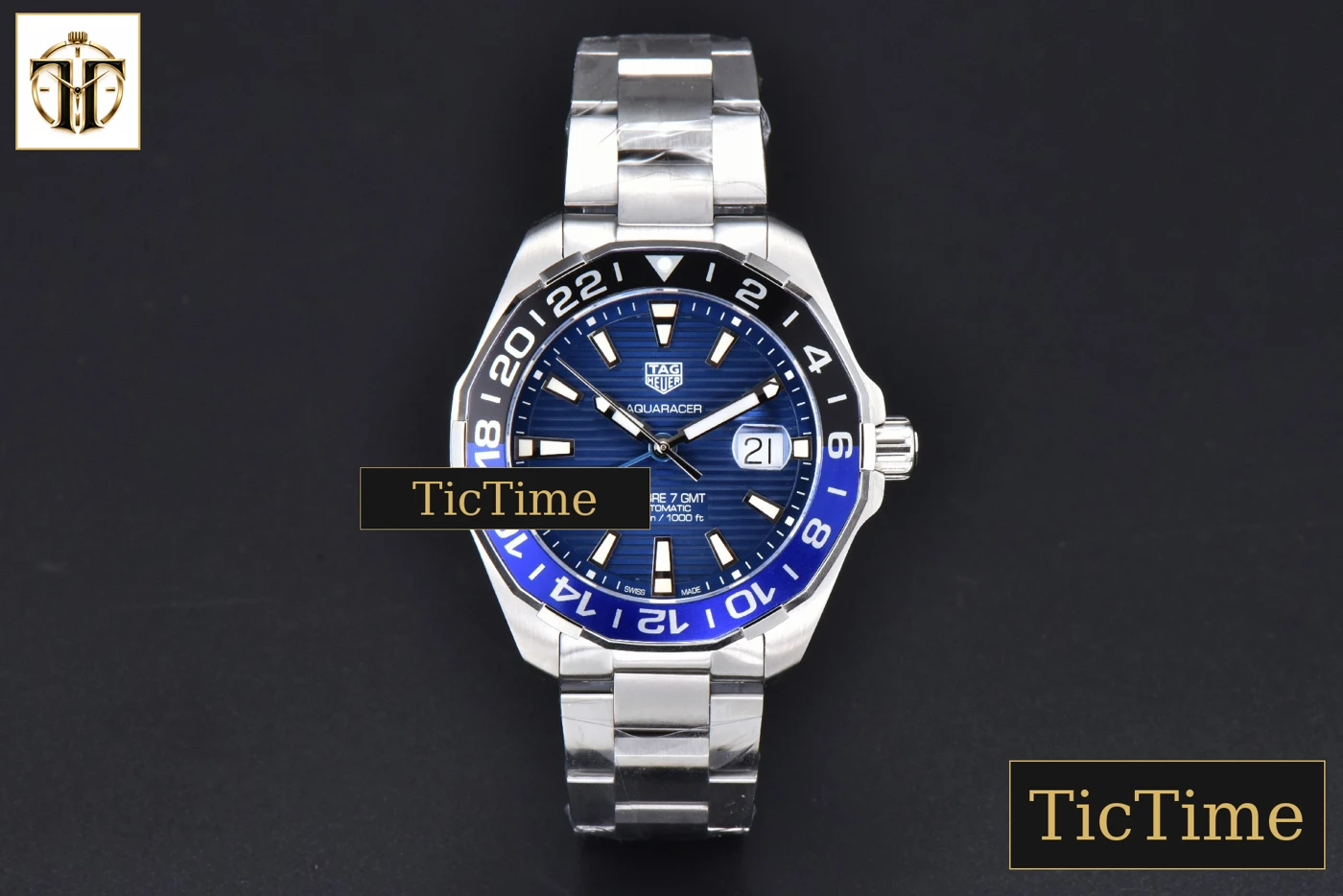 Vista frontal — Aquaracer Calibre 5 GMT 43mm OF Blue/Black Bezel Blue Dial SS Bracelet SW200