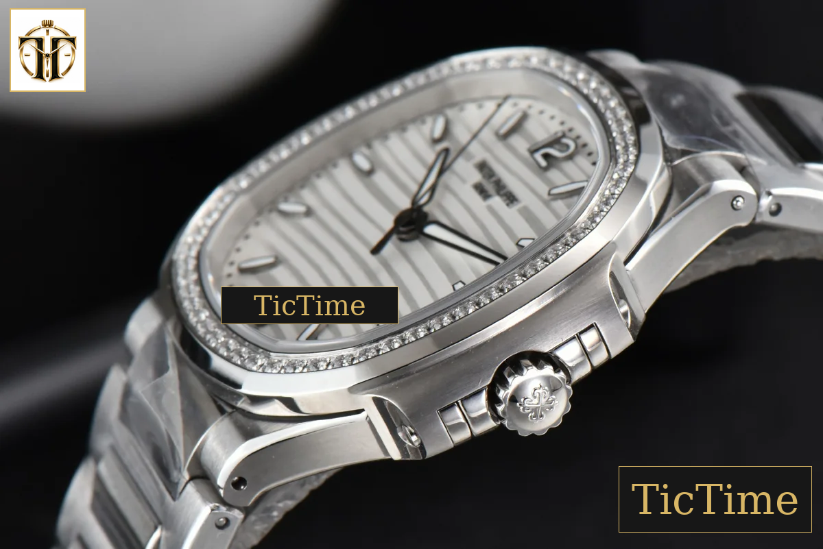 Nautilus Ladies 7118 35mm 3KF Diamond White Dial SS Bracelet 324CS — foto 7