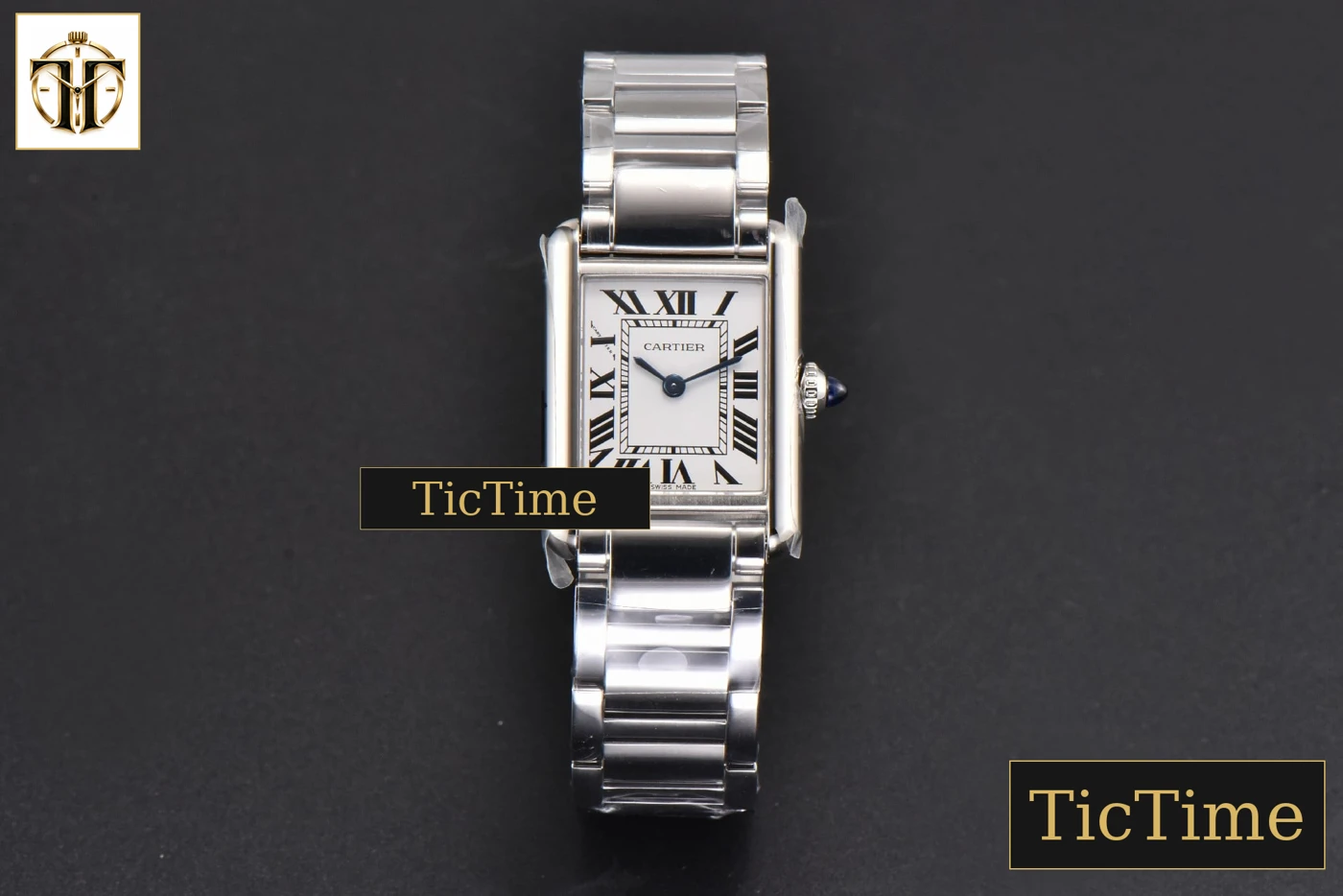 Vista frontal — Tank Must Small 29.5mmx22mm K11F White Dial SS Bracelet Ronda Quartz