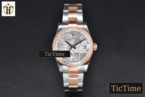 Foto frontal — DateJust 904L 31mm GMF RG/SS Diamond Bezel Silver Flowers Dial Oyster Bracelet A2824