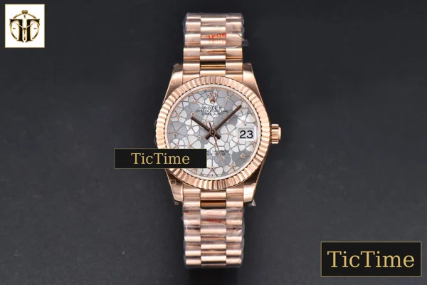 Foto frontal — DateJust 904L 31mm GMF RG Fluted Bezel Silver Flowers Dial President Bracelet A2824