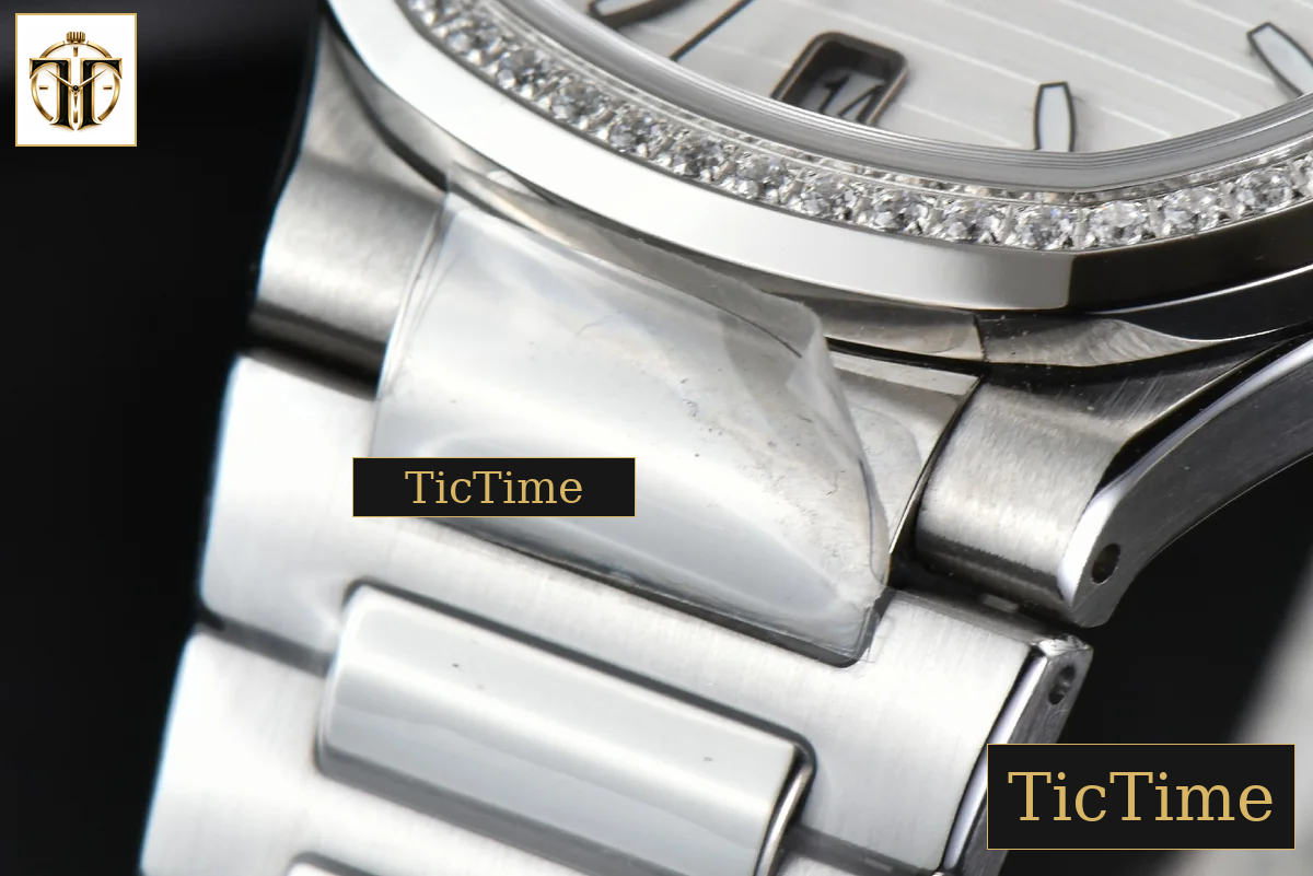 Nautilus Ladies 7118 35mm 3KF Diamond White Dial SS Bracelet 324CS — foto 8