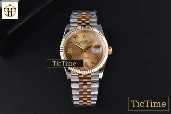 Foto frontal — DateJust 904L 36mm GMF YG/SS Fluted Bezel YG Dial Diamond Roma Marker Jubilee Bracelet VR3235