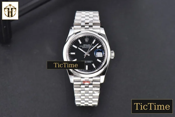 Foto frontal — DateJust 36mm GMF SS Smooth Bezel Black Dial Stick Marker Jubilee Bracelet VR3235