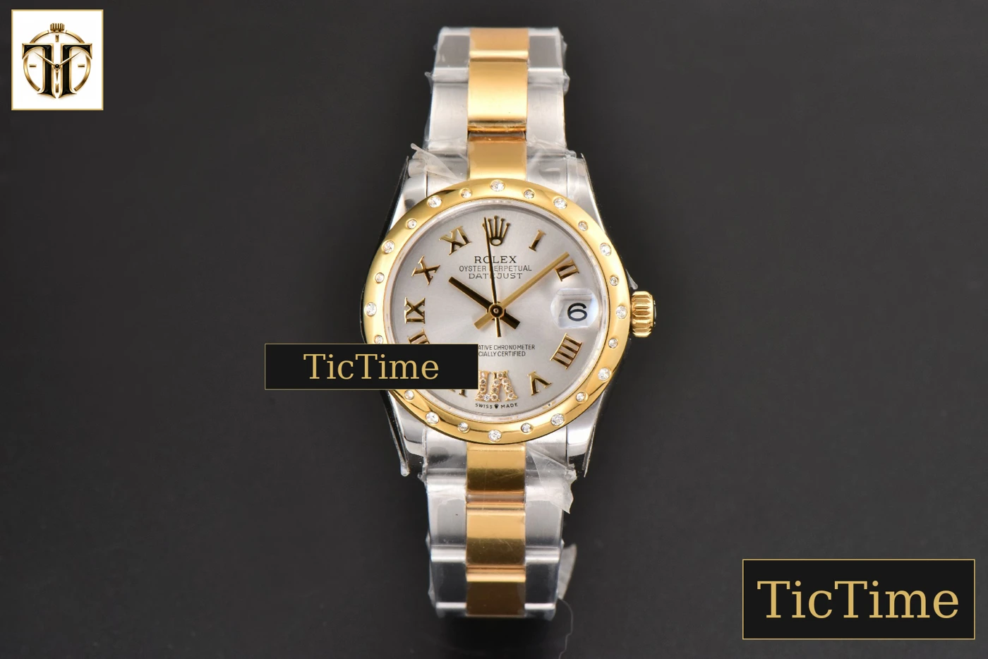 Vista frontal — DateJust Ladies 904L 31mm WF YG/SS Diamond Smooth White Dial Roma Marker Oyster Bracelet A2671