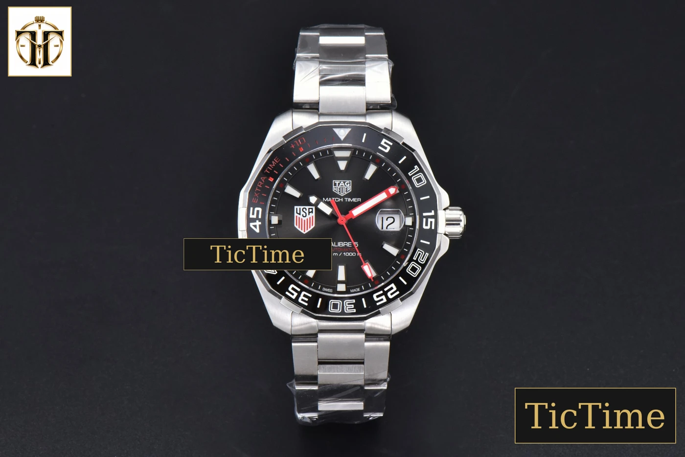 Vista frontal — Aquaracer Calibre 5 43mm OF Black Dial Red Hands SS Bracelet Swiss SW200