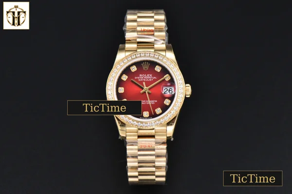 Foto frontal — DateJust 31mm GMF YG Diamond Bezel Red Dial Diamond Marker President Bracelet A2824