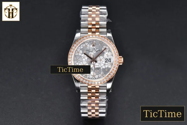 Foto frontal — DateJust 904L 31mm GMF RG/SS Diamond Bezel Silver Flowers Dial Jubilee Bracelet A2824